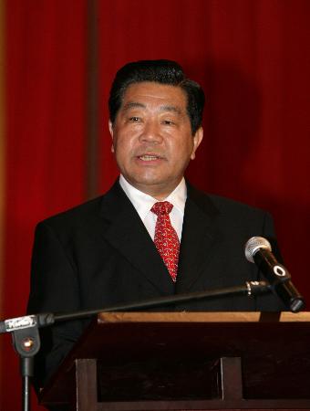 賈慶林：中國將堅持和平發展道路