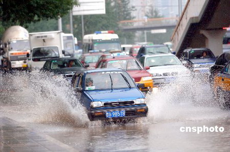 北京普降暴雨四種災害天氣齊襲京城(組圖)