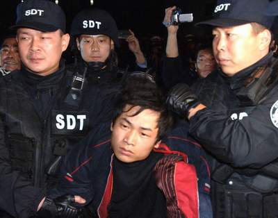 殺害民警疑犯被押解進京是否行賄有待調查