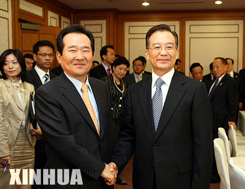 4月11日，正在韓國進行正式訪問的中國國務院總理溫家寶在首爾會見韓國開放國民黨議長丁世均。