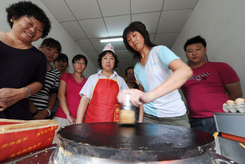 天津煎饼果子项目启动 助下岗失业人员创业-